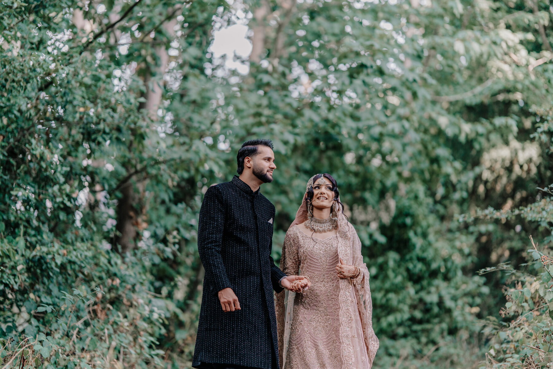 bride and groom in UK woodland portrait